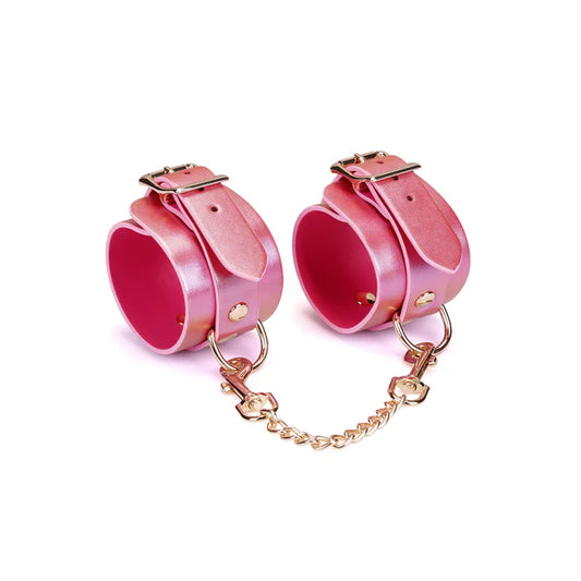 Menottes en cuir rose irisé