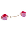 Menottes en cuir rose irisé