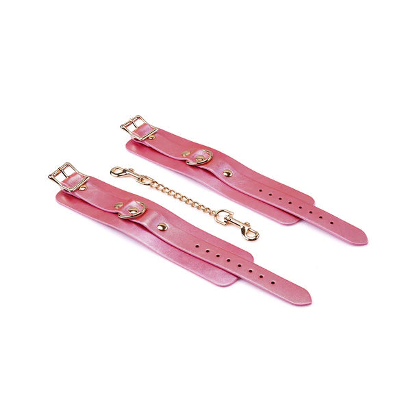 Menottes en cuir rose irisé