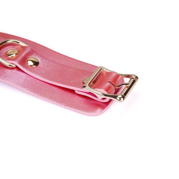 Menottes en cuir rose irisé