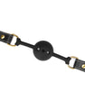 Gag Ball en cuir rigide noir couture